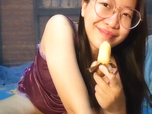 Sexy Asian Girl Eat Banana