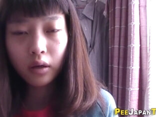 Asian Teen Urinates In Plastic Glass