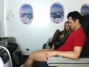 Stewardess gives nylon footjob in plane by Foot Girls