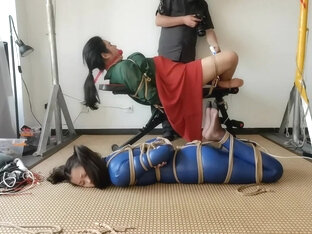 Asian Woman Tied On Top Of Each Other