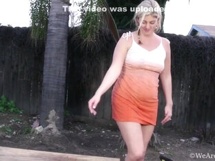 Alicia Silver In Orange Skirt White Blouse